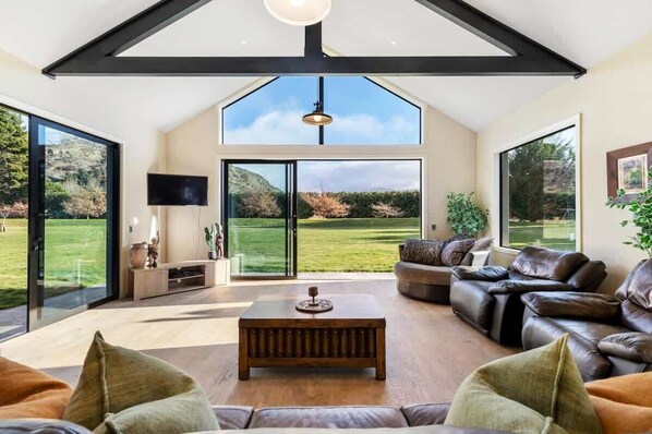 TV, fireplace, books, offices