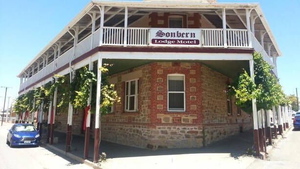 A two-story Sonbern Lodge Motel with a balcony, brick facade, and a signboard. - Sonbern Lodge Motel (Wallaroo)