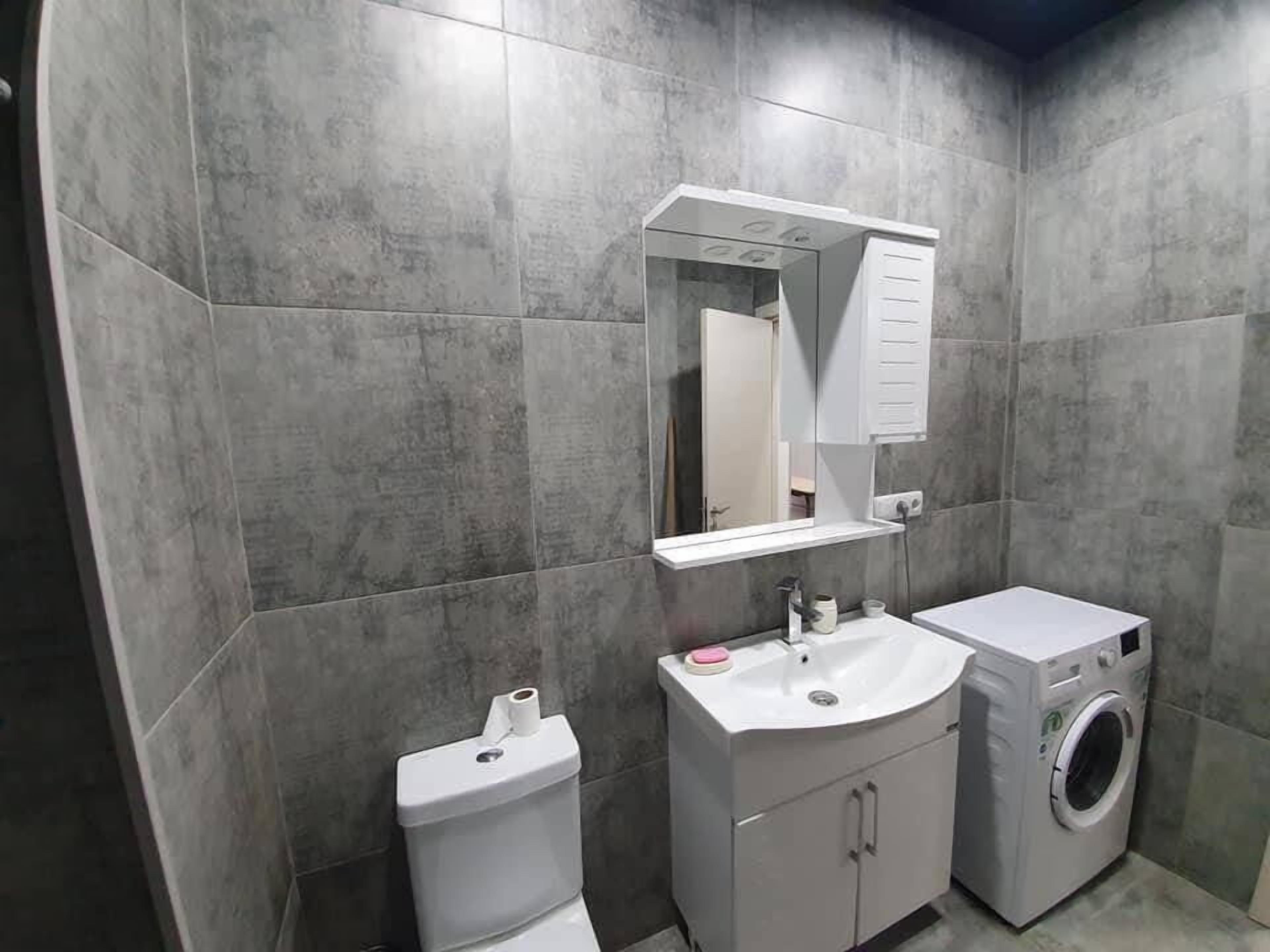 Shower, free toiletries, hair dryer, slippers