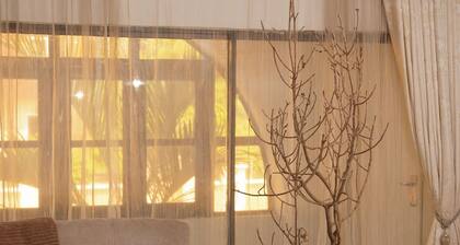 Charming 2-bedroom house with AC, fitness room in wonderful Maitama, Abuja.