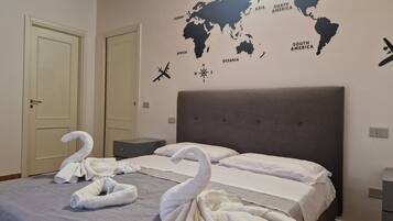 2 bedrooms, desk, iron/ironing board, travel crib