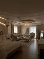 Deluxe Suite, Balcony, Pool View | Soundproofing, free WiFi