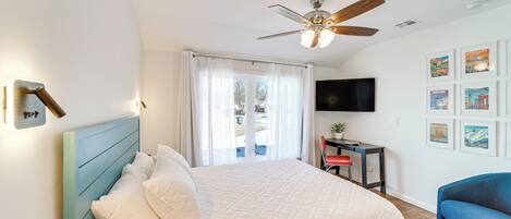 Desk, laptop workspace, bed sheets