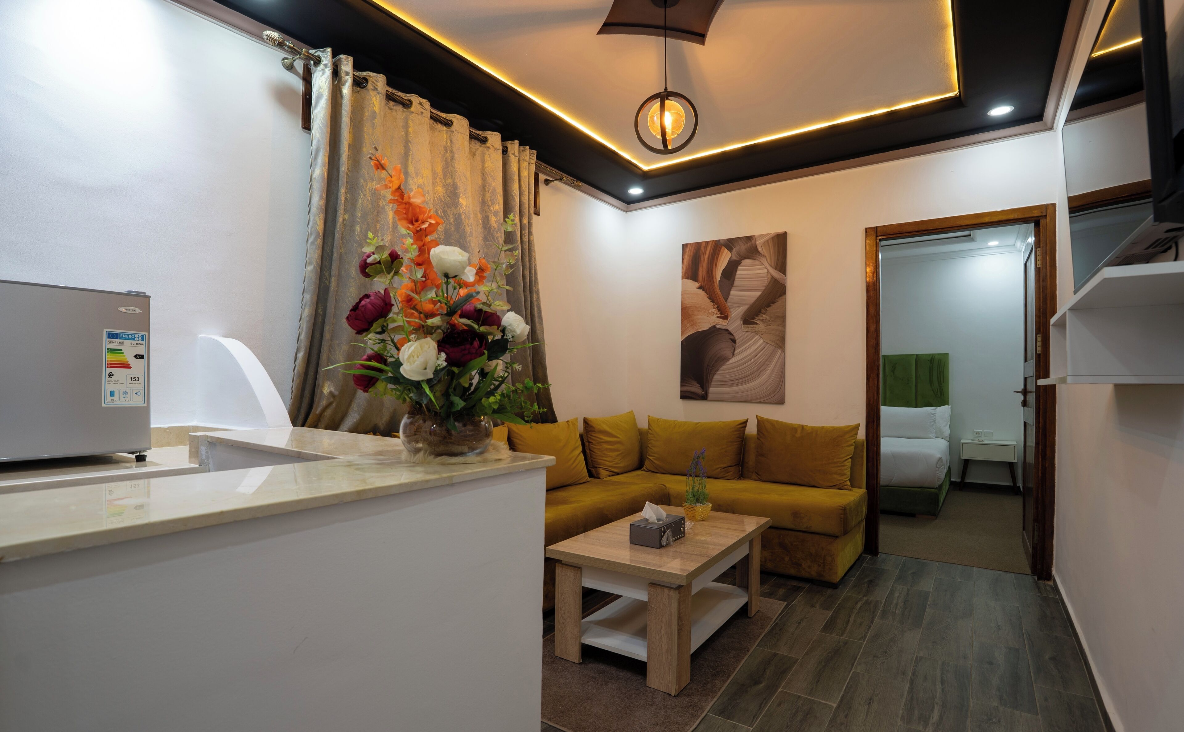 Suite Deluxe | Aire de séjour | Téléviseur