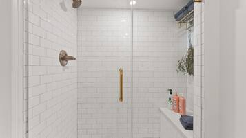 Shower, eco-friendly toiletries, hair dryer, towels