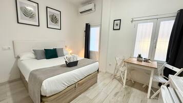 Superior Suite | 1 bedroom, iron/ironing board, bed sheets