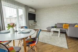 Apartment, 1 Schlafzimmer, Balkon, Gartenblick | Wohnzimmer
