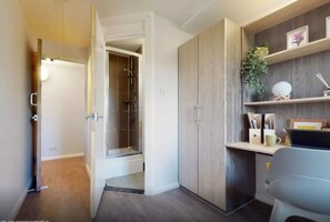 Enjoy a functional space with ample storage and a shower.