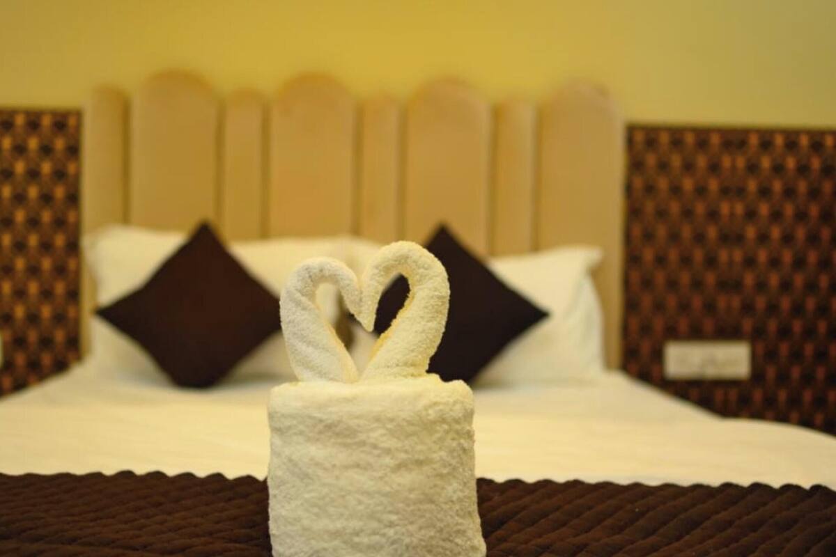 Deluxe Quadruple Room, City View | Free WiFi