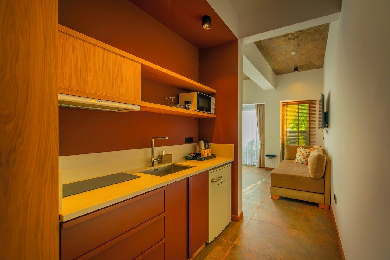 Standard Double Room | Private kitchen | Mini-fridge, eco-friendly cleaning products
