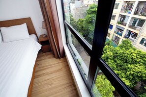 ดีลักซ์อพาร์ทเมนท์, วิวเมือง | 1 ห้องนอน, เครื่องนอนระดับพรีเมียม, โต๊ะทำงาน