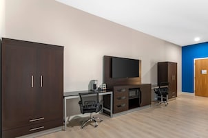 Premium bedding, desk, laptop workspace, blackout curtains