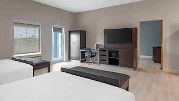 Premium bedding, desk, laptop workspace, blackout curtains