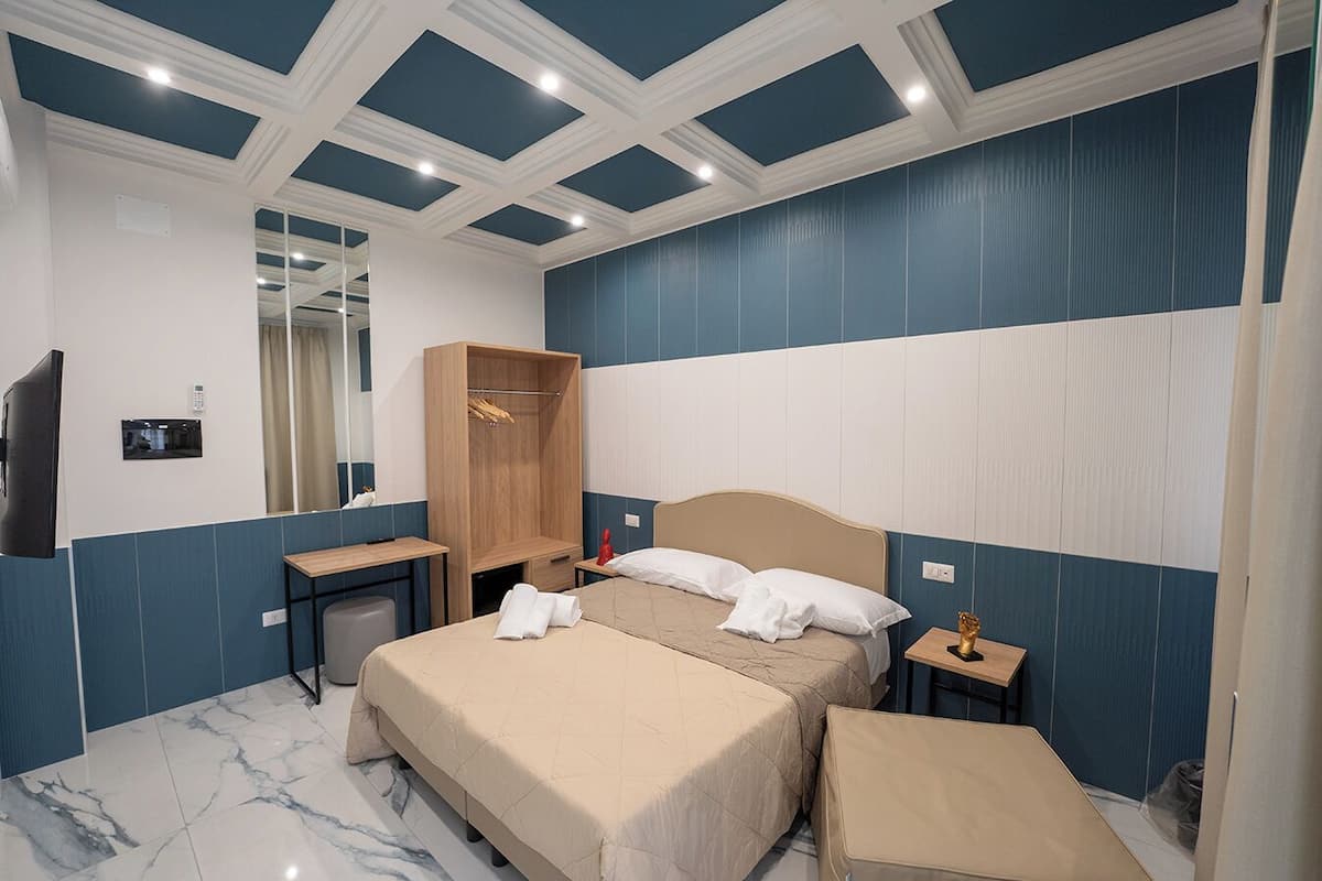 Economy Triple Room, Balcony, Annex Building (Via del Chiostro 25) | Desk, cribs/infant beds, free WiFi, bed sheets