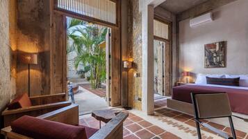 Traditional Suite, Courtyard Area | Premium bedding, in-room safe, laptop workspace