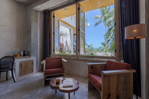 Ocean View Suite | Premium bedding, in-room safe, laptop workspace, iron/ironing board