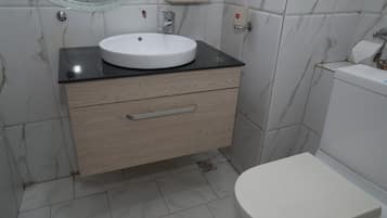 Hair dryer, towels, soap, shampoo