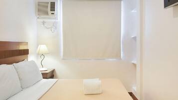 Premium bedding, desk, laptop workspace, free WiFi