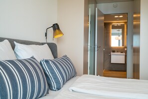 1 غرفة نوم ومكواة/لوح كي وواي فاي مجانًا وملاءات أسرّة