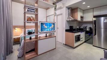 Fridge, microwave, cookware/dishes/utensils