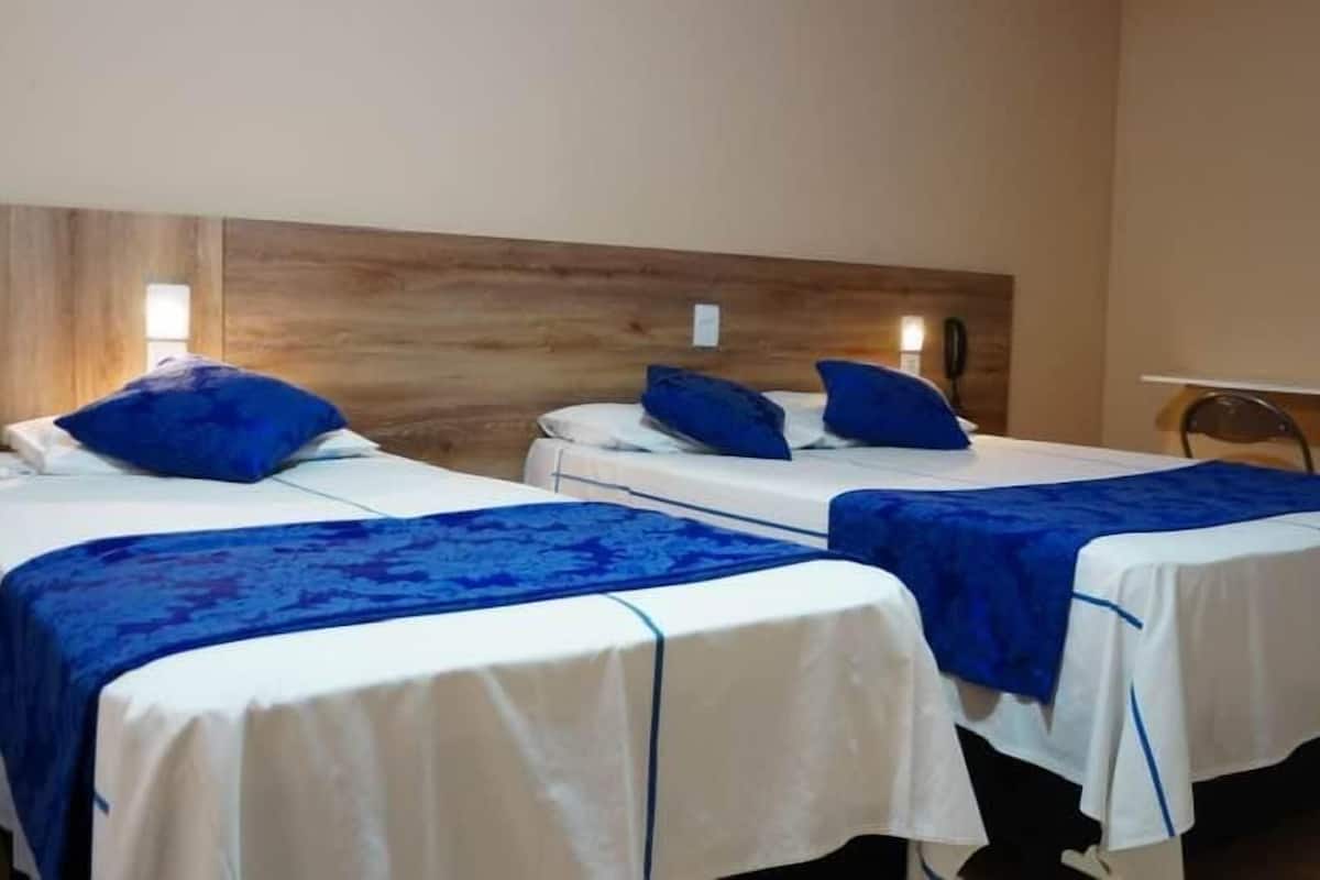 Triple Room, Non Smoking | Laptop workspace, free WiFi, bed sheets