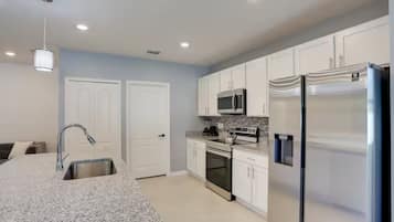 Luxury Room, Pool View | Private kitchen | Full-sized fridge, microwave, oven, stovetop