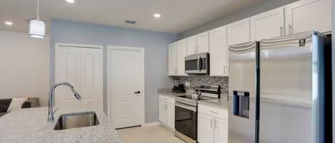 Luxury Room, Pool View | Private kitchen | Full-size fridge, microwave, oven, stovetop