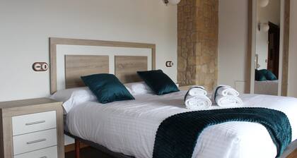 Quiet house on the outskirts of the city surrounded by pine forests and hills.