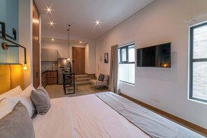 1 habitación, tabla de planchar con plancha, cuna de viaje y wifi