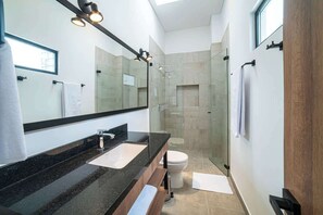 Shower, hair dryer, towels, soap