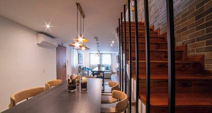 E105 - Two Story 4-bed / 3-bath Unit with parking
