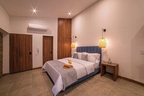 1 bedroom, desk, iron/ironing board, travel crib