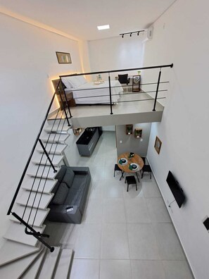Deluxe Studio, 1 Bedroom, Air conditioning, City View | Blackout curtains, iron/ironing board, free WiFi, bed sheets - LOFTS INDAIATUBA (Indaiatuba)
