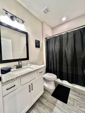 Shower, towels, soap, toilet paper
