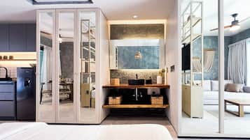 Shower, rainfall showerhead, hair dryer, towels
