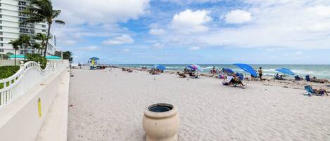 On the beach, sun-loungers, beach towels