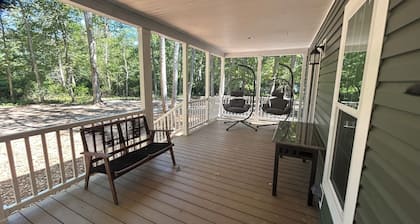 Shire House vibrant spacious cabin safe family pet friendly fire pit trails fish