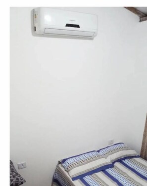 1 quarto, Wi-Fi de cortesia, roupa de cama