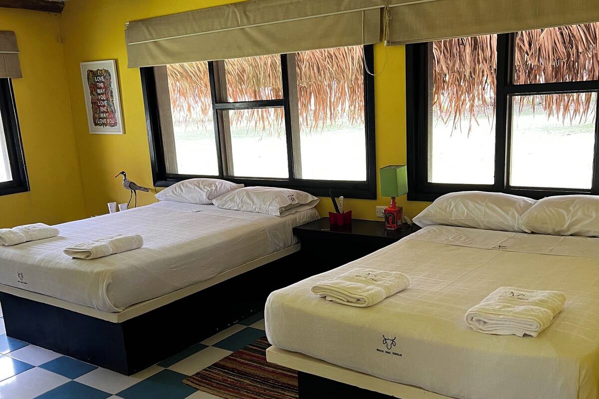 Vierpersoonskamer, uitzicht op tuin | 1 slaapkamer, gratis wifi, beddengoed