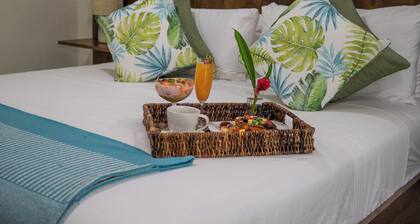 Spacious King Suite at Resort with a river view in gorgeous Roaring Creek Belize