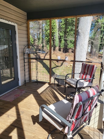 Terrace/patio. Charming bedroom and bath with private entrance and screened porch .