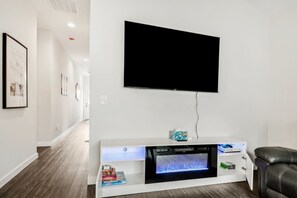 Smart TV, fireplace, video games, DVD player