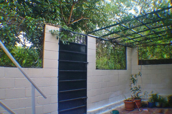 Habitación Deluxe, balcón, vistas al jardín | Terraza o patio