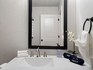 Eco-friendly toiletries, hair dryer, towels, soap