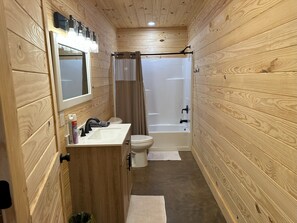 Shower, towels, toilet paper
