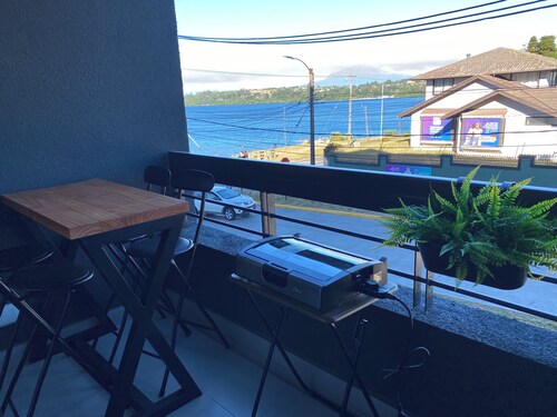 Coastal apartment with lake view, heated swimming pool and jacuzzi