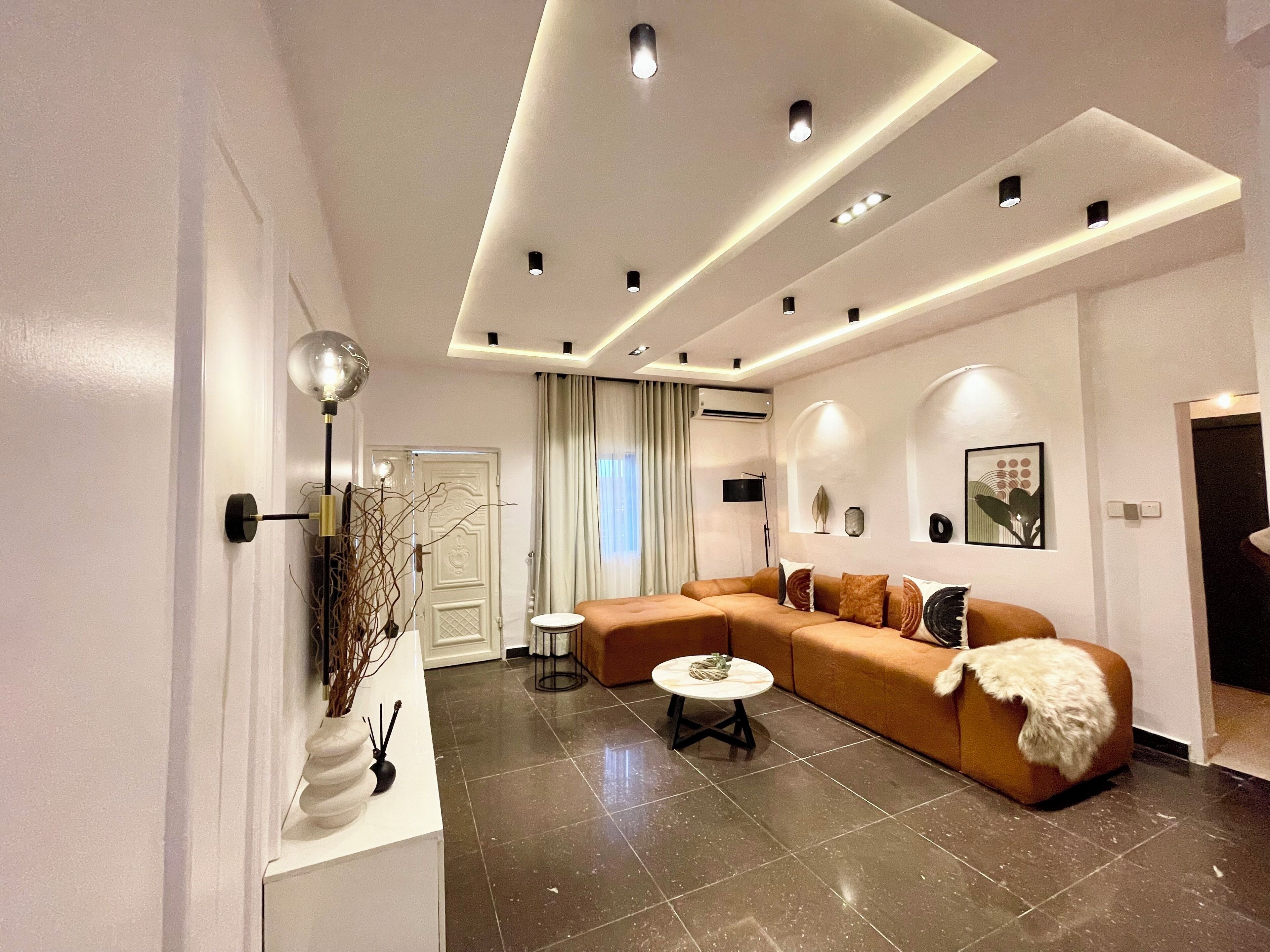 Deluxe Apartment, 3 Bedrooms, Private Bathroom, Courtyard View | Living area | 75-inch Smart TV with digital channels, video-game console, Netflix