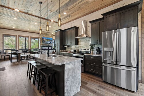 Rooftop Swim-Spa & Hot Tub • Unobstructed Views • Game Room • Clubhouse Access