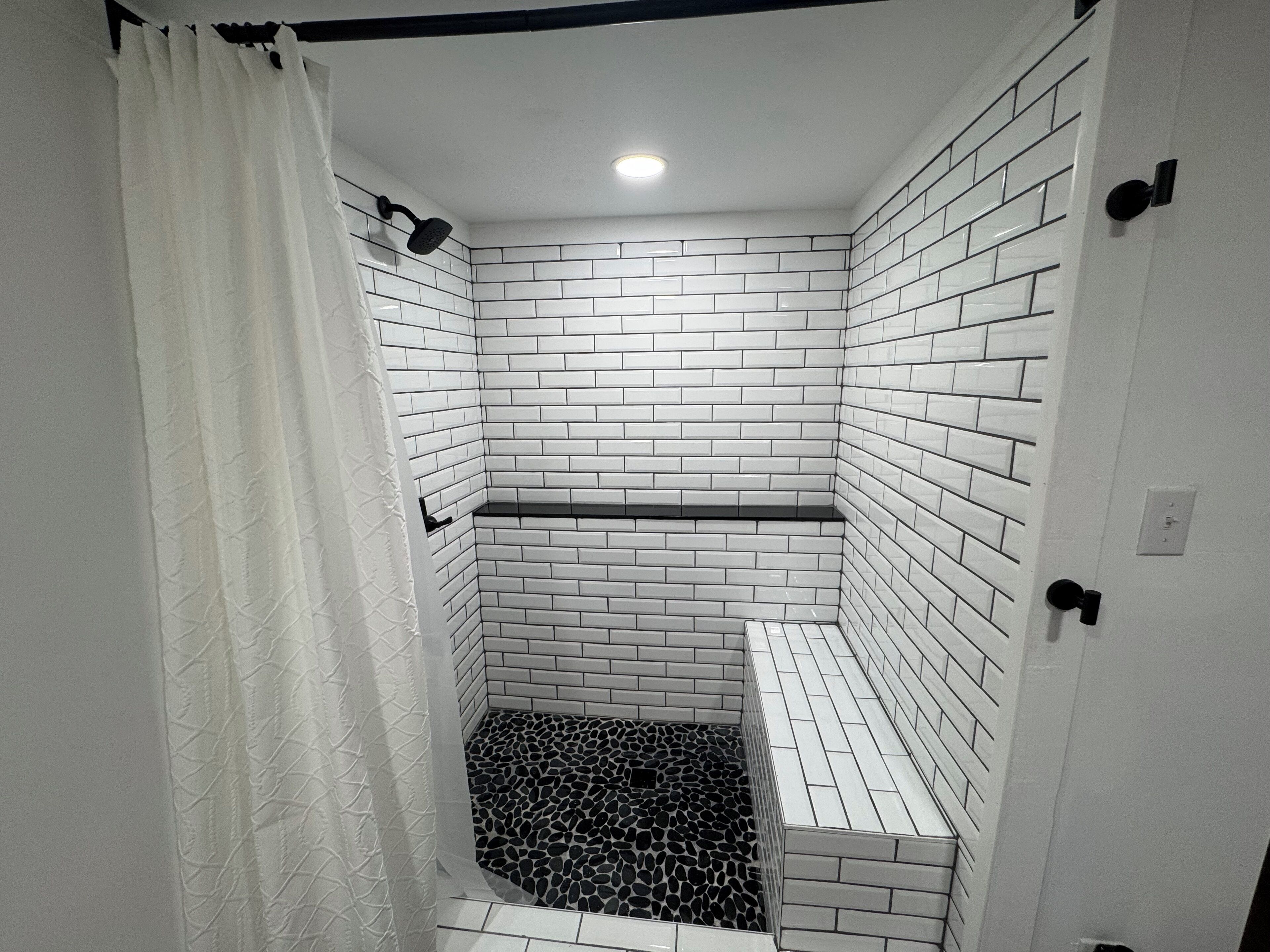 Shower, towels, soap, toilet paper