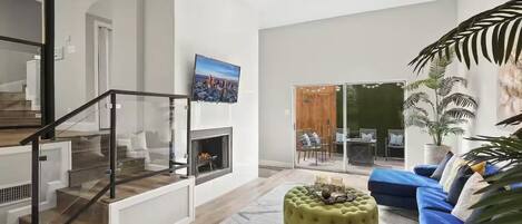 Smart TV, fireplace, books